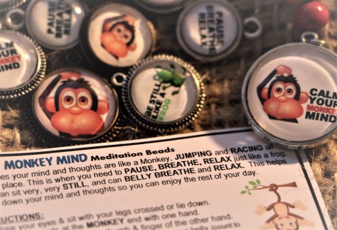 Childrens workshop, create your own relaxation beads, with the choice of monkey mind pendants and sit still like a frog pendants. Each has 9 coloured beads which represent each breath. All beads come with an instruction card.